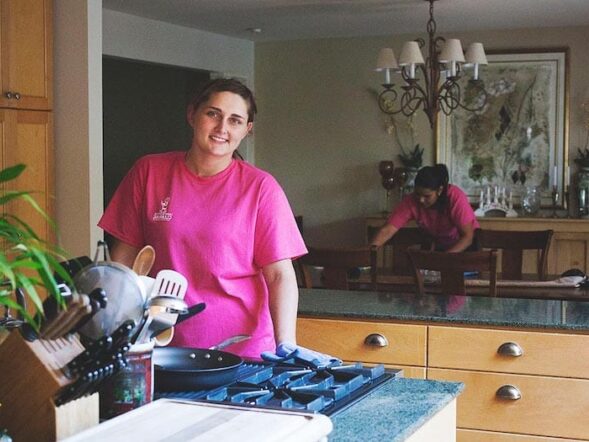 employee cleaning a kitchen