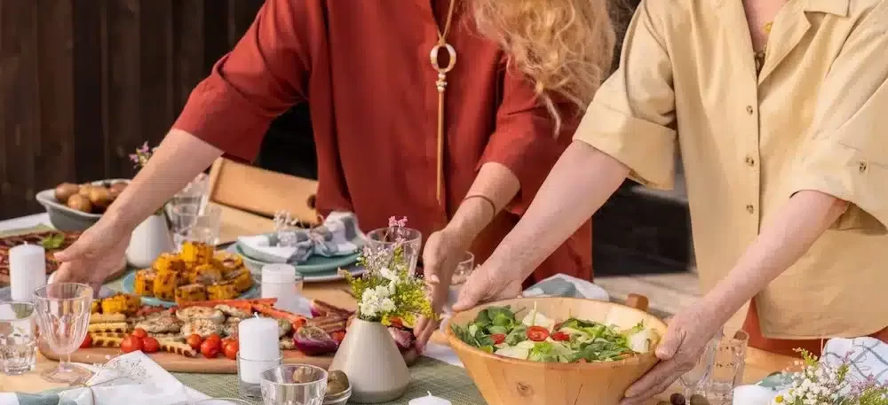 family serving dinner