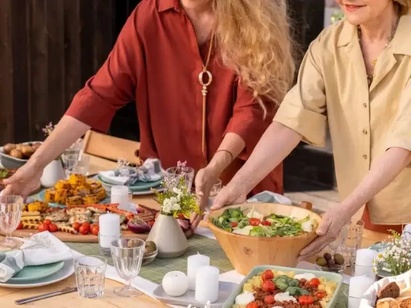 family serving dinner